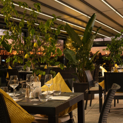 Moody twilight ambiance at 22 Bar Patio with soft lighting