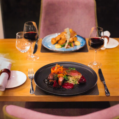 Warm and inviting evening dining setup at Earth Vine